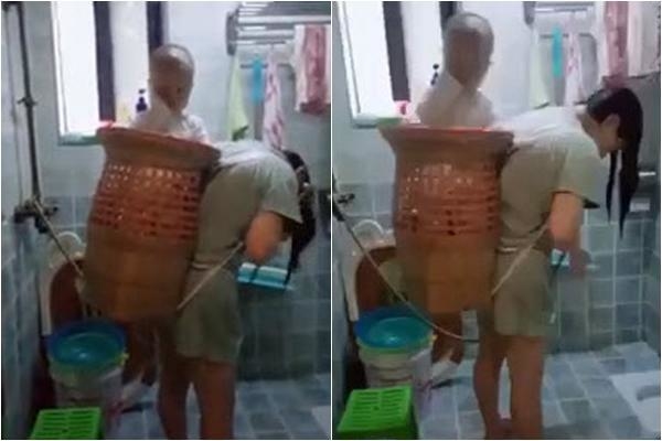 Clip vừa địu con vừa gội đầu, khiến ai xem cũng xúc động