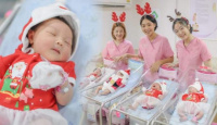 Chào đời vào Giáng sinh, các em bé được bệnh viện mặc đồ đỏ ăn mừng