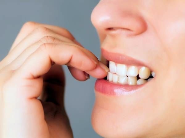 Người hay cắn móng tay là người theo chủ nghĩa cầu toàn