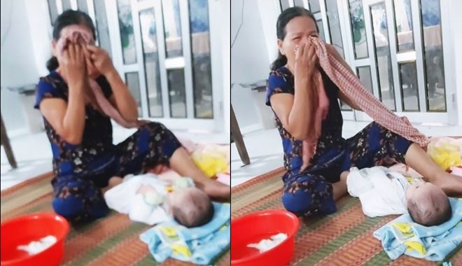 Con gái hết ngày ở cữ bà ngoại vừa tắm cháu vừa sụt sùi khóc