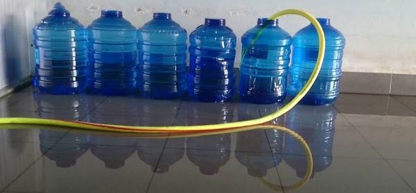 Nước đóng bình 20 lít 15k: Rẻ, tiện lợi nhưng mầm bệnh đầy người