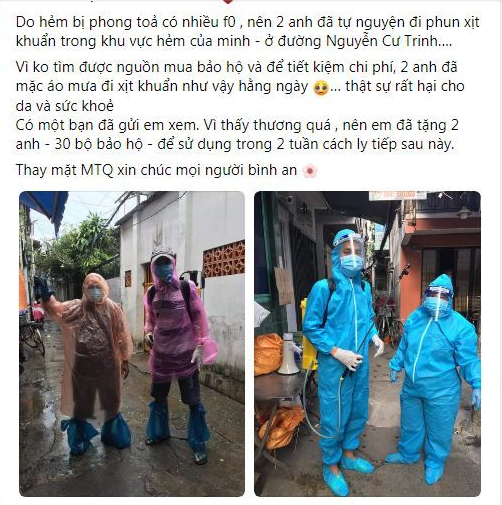 Cảm động 2 anh mặc áo mưa đi phun khử khuẩn trong khu phong tỏa