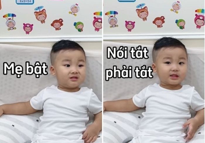 Bo Thúi đưa hai tay mẹ cho con xem tivi còn biết nịnh câu giờ