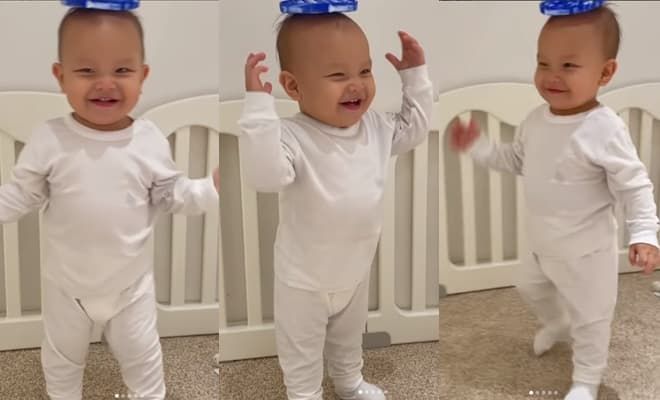 Cậu ú Leon hưởng gen model của mẹ: Mang vật trên đầu vẫn di chuyển tốt