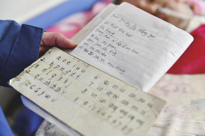 10 năm chăm chồng bệnh, tự tạo bảng mã nói chuyện với chồng