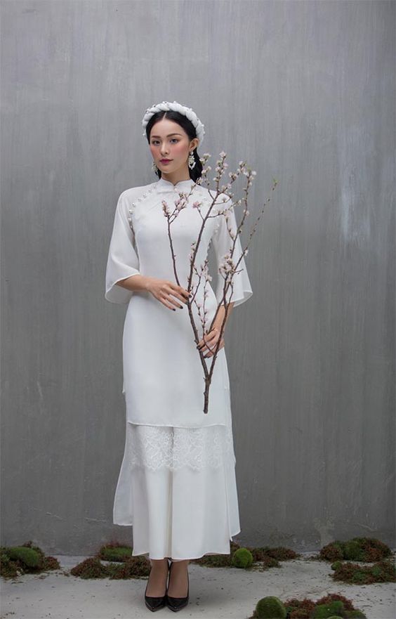 Tết cận kề, chị em lưu ngay các mẫu áo dài du xuân cho cả năm thêm đỏ