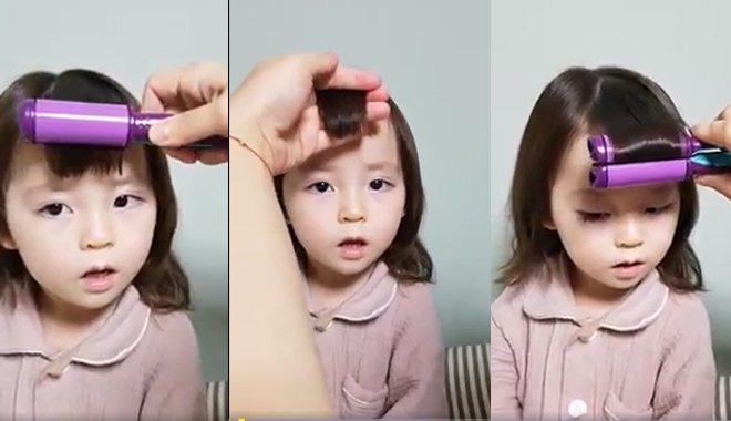 Điệu bộ đáng yêu của bé gái khi được bố làm điệu khiến cư dân mạng muốn "rụng tim" 