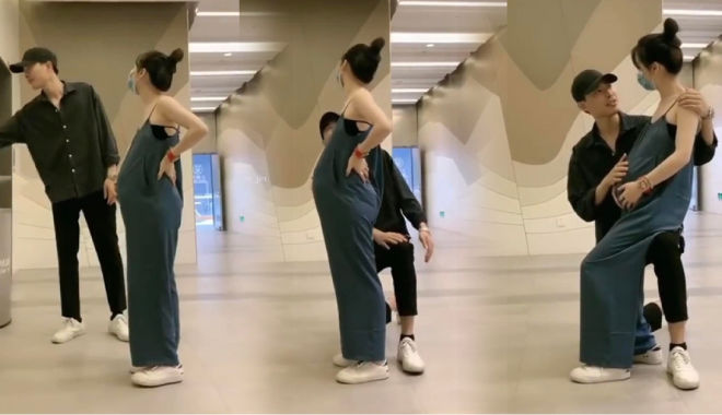 Thương vợ bầu, chồng quỳ gối để vợ ngồi đỡ mỏi chân lúc chờ thang máy