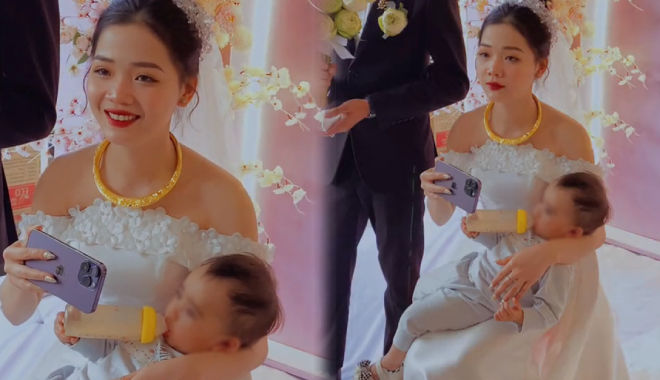 Cô dâu tranh thủ cho con uống sữa trong chính hôn lễ của mình